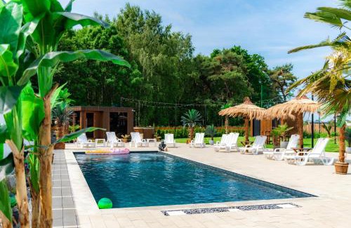 Nowecin House | Domki Piaskowa11 Palm Resort & Wellness
