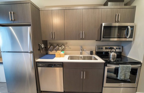 Central Okanagan Apartment | Downtown Condo - Walk to the Beach!