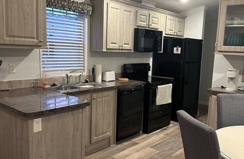 Palm Harbor Cottage | Duned-Inn: Where Dunedin Charm, Beach Days, and Pool Time Fun Collide