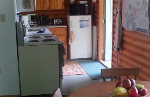 Richmond County Cottage | Eberhards logcottage 2 - St. Peter's, Nova Scotia, right on the Lake
