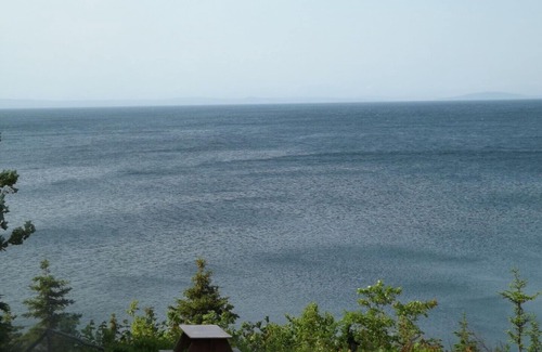 Richmond County Cottage | Eberhards logcottage 2 - St. Peter's, Nova Scotia, right on the Lake