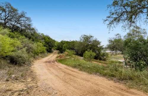 Spicewood Cabin | Edge Water Escape on Lake Travis - by PMI Austin Metro