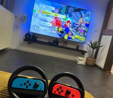 Region Hannover District Apartment | einfachHEIMISCH - GameLOFT - Shuffleboard - 3WCs - Arcade - Nintendo