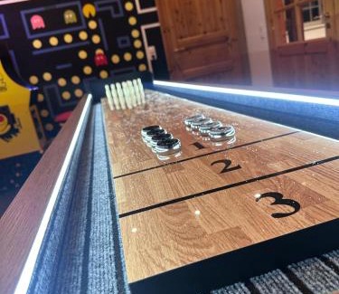 Region Hannover District Apartment | einfachHEIMISCH - GameLOFT - Shuffleboard - 3WCs - Arcade - Nintendo