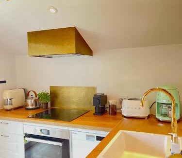Vejlby Risskov Apartment | Eksklusiv taglejlighed med hav- og skovudsigt