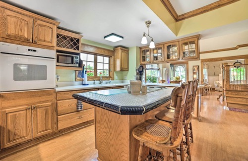 Alden Cottage | Elegant 1905 Home: Steps to Torch Lake & Dtwn