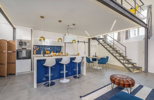 Portel House | Elegant Loft with Historic Charm and Terrace