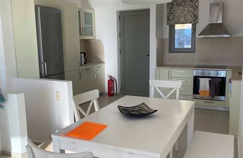 Koutsouras Apartment | Elegant, Modern apt. Shared Swimming Pools. 5 min walk to Beach sleeps 6