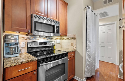 North University Condo | Elegant, Quiet, and Beautiful Rustic Home Blocks from UT and Downtown