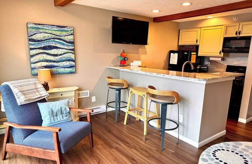 Onekama Condo | ENJOY 2 LAKES: NEW Portage Lakefront condo-HOT TUB OPEN ALL WINTER!