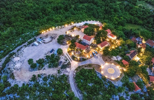 Vrgorac House | Enjoy a wonderful view of the countryside from this inviting vacation home with pool access.