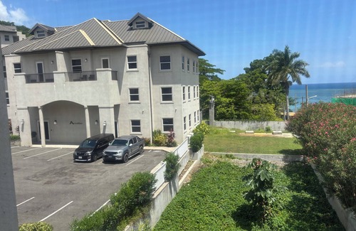 Reading Apartment | Enjoy and relax! Spacious 2/2, ocean views, gym,& pool, in lovely Montego Bay!