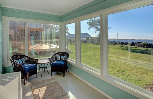 Seaside House | Enjoy Riverfront Views from the Porch, short drive to Beach and Promenade