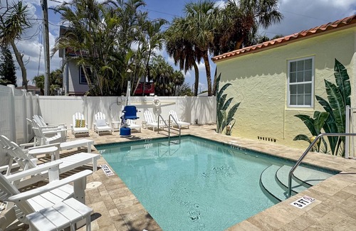 Madeira Beach Cottage | Entire Island Paradise Cottages – Heated Pool, Tiki Hut, Walk to Beach, 8 Units, Sleeps 30