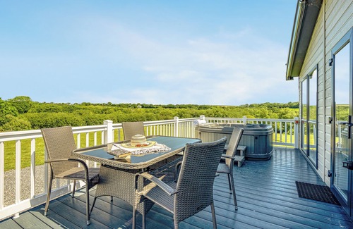 Hewas Water Ski Chalet | Escape to the Jasmine Lodge, nestled amidst stunning rolling countryside.