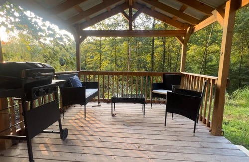 Betsy Layne Apartment | Escape to Tranquility at Wanderer's Oasis – Your Boho-Inspired Cabin Retreat