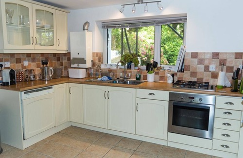 Salcombe Apartment | Excellent location, south facing balcony, private patio and designated parking