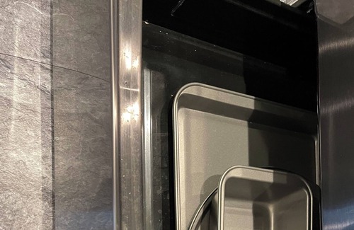 Saskatoon House | Executive 1BR+Den Walk-Out Suite Backing Park