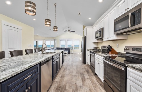 South Nags Head House | Experience luxury at 1 Perfect Vacation, a spacious oceanfront retreat in South Nags Head