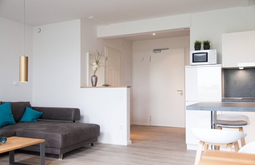 Dornum Apartment | "Experience unforgettable vacation days in nature at Gulfhof Polder72!"