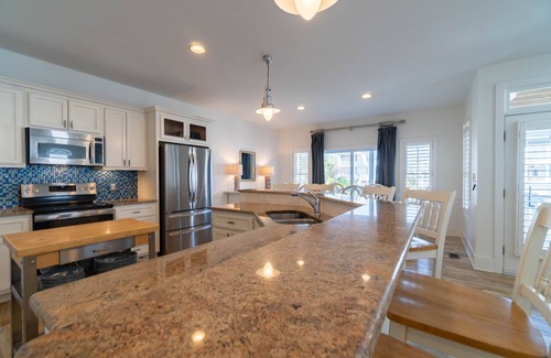 Ocean Isle Beach House | Exquisite-CanalWaterfront,5br/5.5ba Elevator HTub GolfCart,PPong,all includedWOW