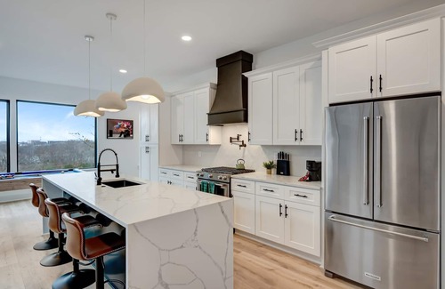 Hurwood Heights House | Fall rooftop hot tub, game room, sauna near Broadway and Geodis Park