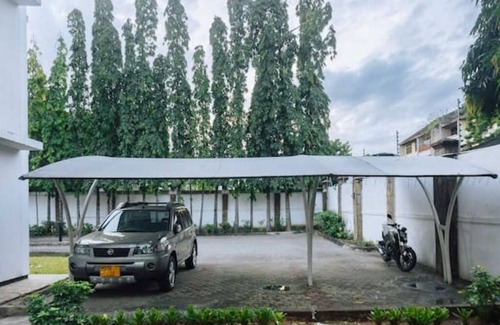 Mwananyamala Apartment | Family-Friendly 2BR | Central, Breakfast, Workspace & Gen set