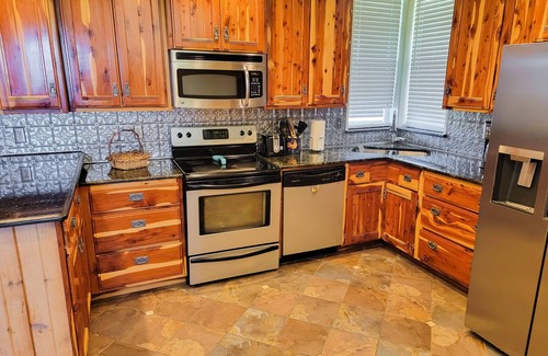 Cleburne Other | Farmhouse-style home with a balcony, gas grill, separate loft, W/D, and AC