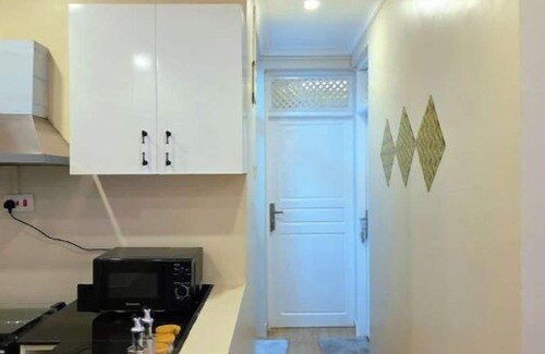 Dar es Salaam Apartment | Fefe's 2BR Apartment with Swimming Pool