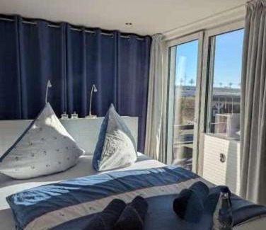 Mustin House | Ferienhaus am See mit Ruderboot