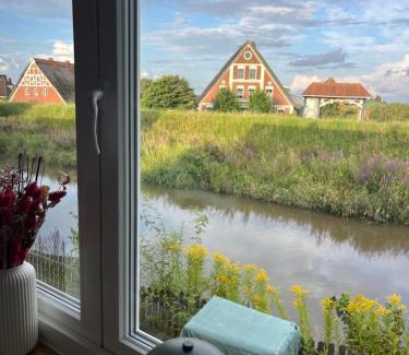 Luhe Apartment | Ferienhaus "Deichperle" mit Flussblick