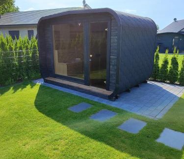 Barssel House | Ferienhaus Devilina mit Sauna und Kamin am Harkebrügger See