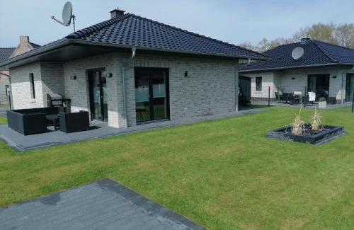 Barssel House | Ferienhaus Devilina mit Sauna und Kamin am Harkebrügger See