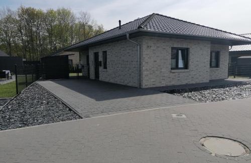 Barssel House | Ferienhaus Devilina mit Sauna und Kamin am Harkebrügger See