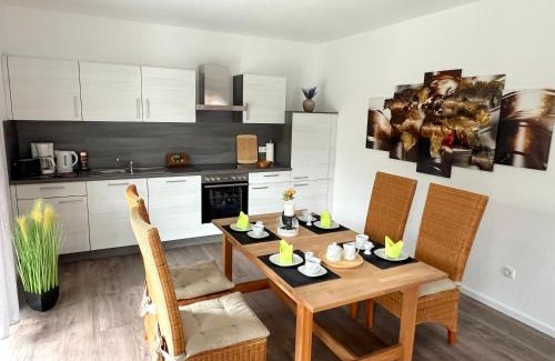 Papenburg Apartment | Ferienwohnung "Calypso" Papenburg Ebenerdig Terrasse Einbauküche Neubau 84 qm Free Wifi 2 Schlafzimmer