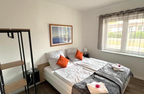 Papenburg Apartment | Ferienwohnung "Calypso" Papenburg Ebenerdig Terrasse Einbauküche Neubau 84 qm Free Wifi 2 Schlafzimmer