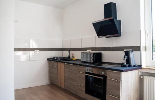 Salzbergen Apartment | FeWo 10P Küche TV WF