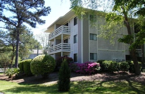 Folly Field Condo | First Floor Condo - One Block from Beach - Bikes Included!