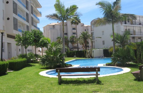 L'Alfas del Pi Apartment | First line beach apartment with large terrace, communal pool and garage