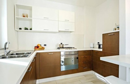 Marchesana Apartment | Flat with barbecue, terrace and pool