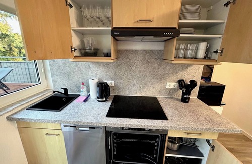 Kaltenweide Apartment | Flughafennähe, 24h-self-checkin, große Dachterrasse, WLAN, Smart-TV, Klima