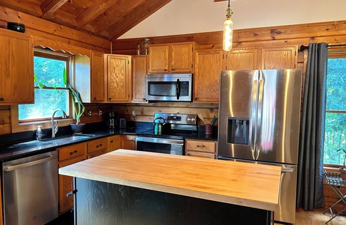 Merrimac Cabin | Four bedroom log cabin, less than 5 miles to Lane Stadium!