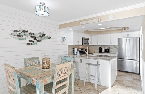 Thomas Drive Condo | FREE Chairs! Gulf Front 1 bed - 2 bath Condo PW510