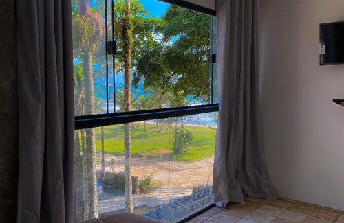 Guaiuba Hotel | Frente ao Mar - Suites com Piscina Aquecida, SPA Privativo, Vista ao Mar ou Montanha, com Estacionamento- Raizes do Mar ECO Hotel