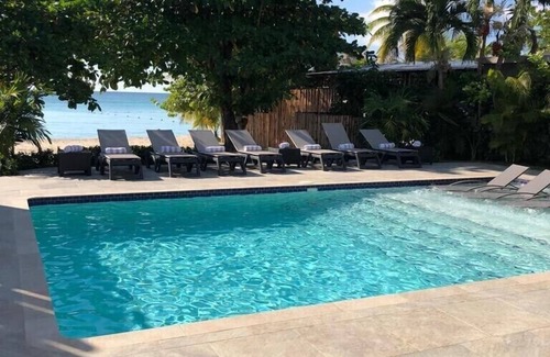 Negril Villa | Fully staffed. private, Beachfront villa with a pool in Negril, Jamaica