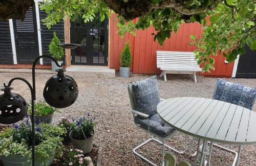 Vadstena House | Gårdshus med spabad utomhus