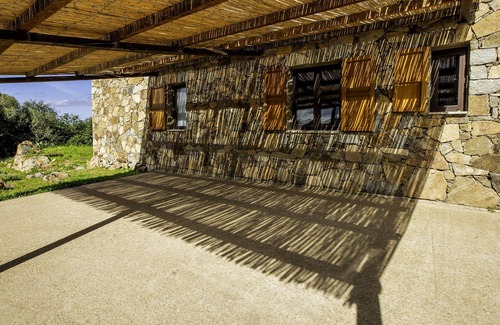 Trinita d'Agultu e Vignola House | Gallurese stazzu in the countryside with sea view above Li Feruli