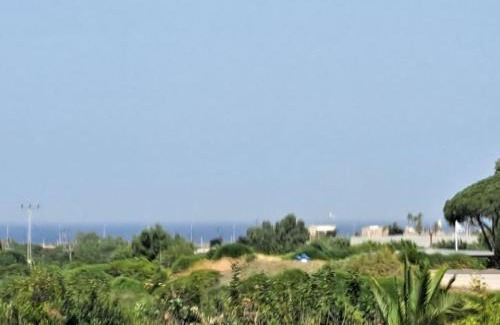 Caesarea Apartment | Garden apartment in Neot Golf, with sea view