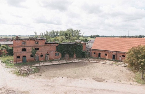 Werben Apartment | GARDEN FLOOR EAST: wood-burning stove and terrace to the southeast