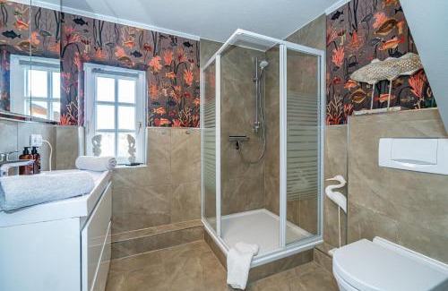 Keitum Apartment | Gemütliche Wohnung unter Reet mit Pool und Sauna in Keitum